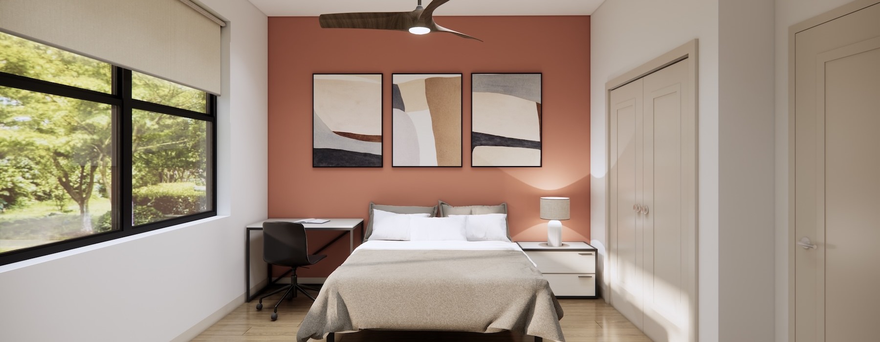 a bedroom with a bed and wall art