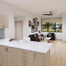 a person sitting in a chair in a livingroom